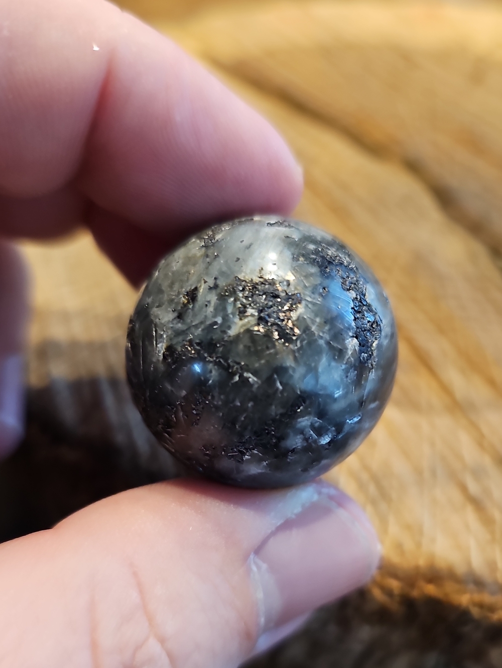 Polished Larvakite Sphere with Metallic Veining